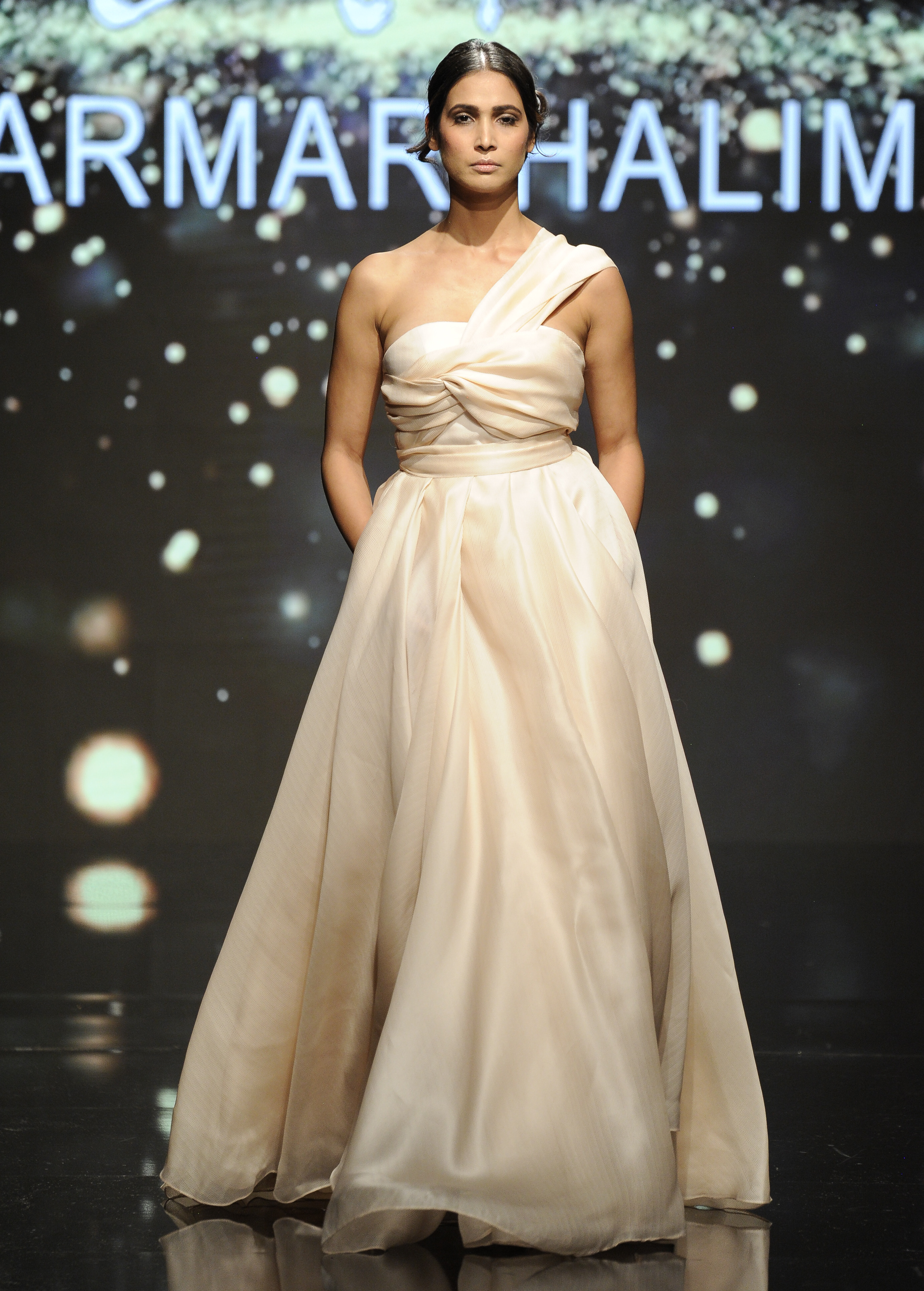 LOS ANGELES, CA - OCTOBER 09: A model walks the runway wearing Marmar Halim at Art Hearts Fashion Los Angeles Fashion Week presented by AIDS Healthcare Foundation on October 9, 2016 in Los Angeles, California. (Photo by Arun Nevader/Getty Images for Art Hearts Fashion)