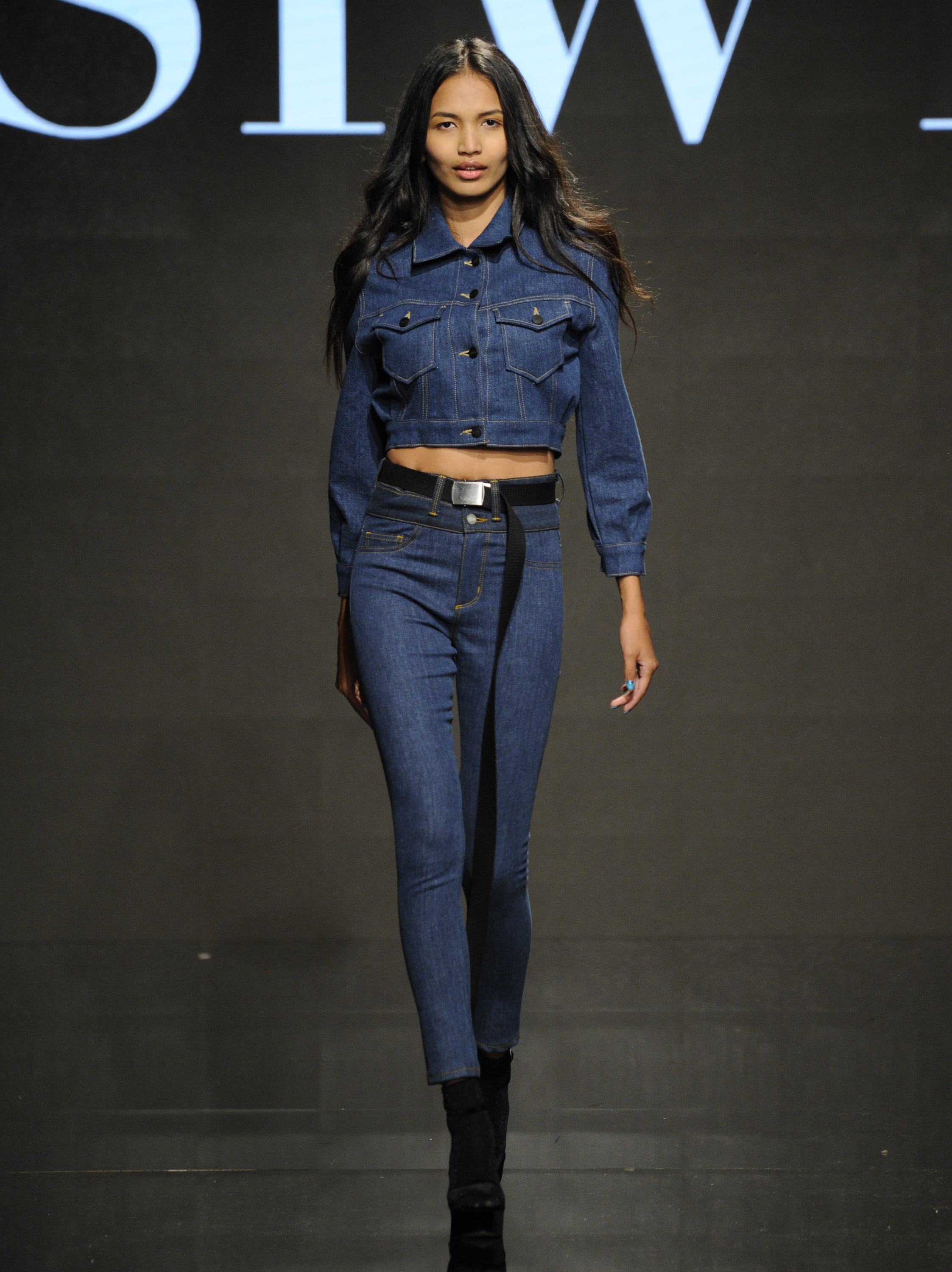 LOS ANGELES, CA - OCTOBER 10: A model walks the runway wearing Siwy Denim at Art Hearts Fashion Los Angeles Fashion Week presented by AIDS Healthcare Foundation on October 10, 2016 in Los Angeles, Californiap (Photo by Arun Nevader/Getty Images for Art Hearts Fashion)