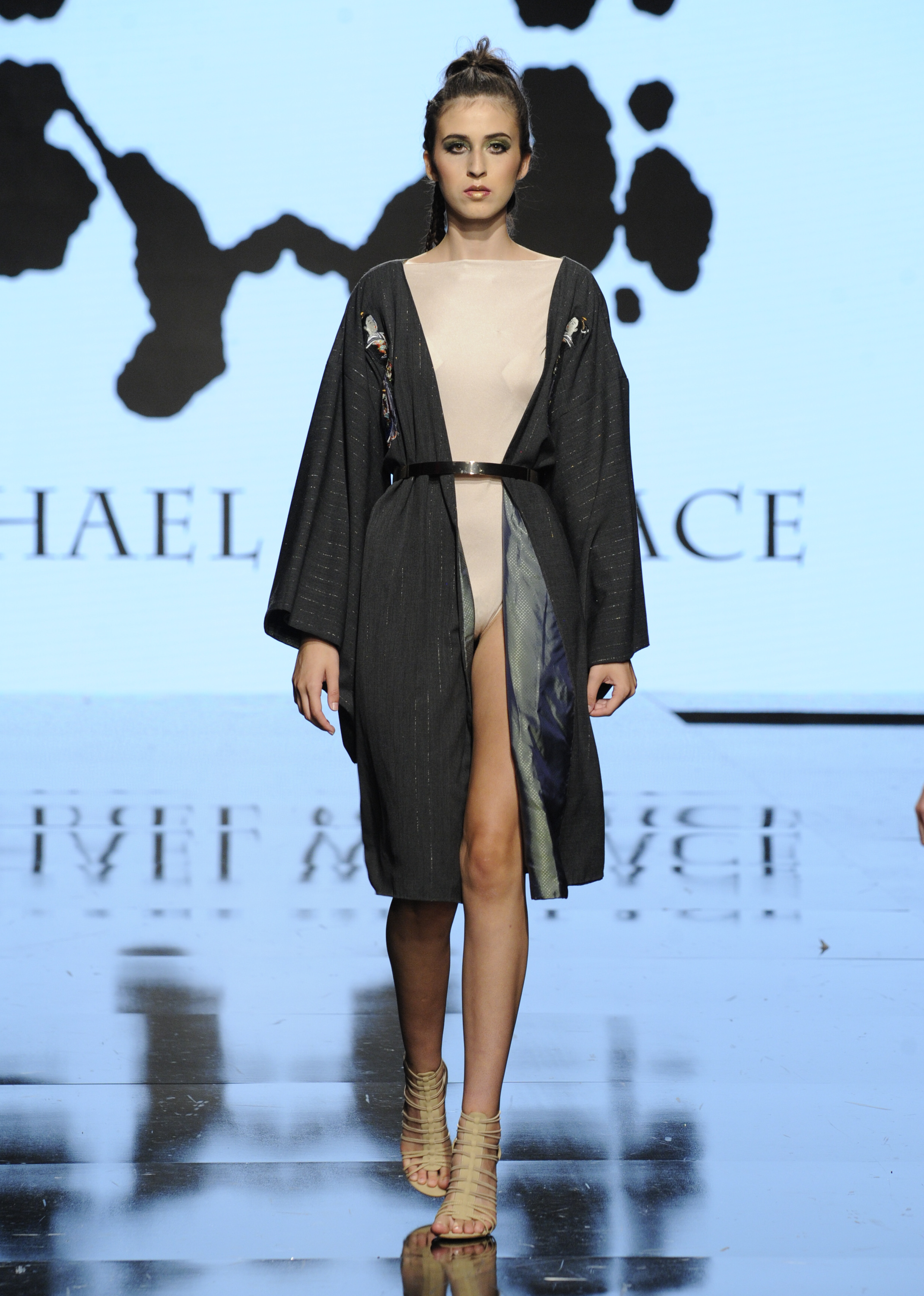 LOS ANGELES, CA - OCTOBER 10: A model walks the runway wearing Michael Wallace at Art Hearts Fashion Los Angeles Fashion Week Presented by AIDS Healthcare Foundation on October 10, 2016 in Los Angeles, California. (Photo by Arun Nevader/Getty Images for Art Hearts Fashion)